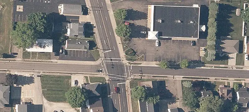 Signalized-Corner Storefront with Drive-Through