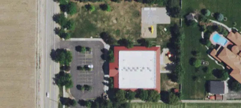 School Building with Fenced Playground