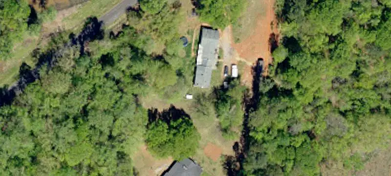 Wooded Land With Pond