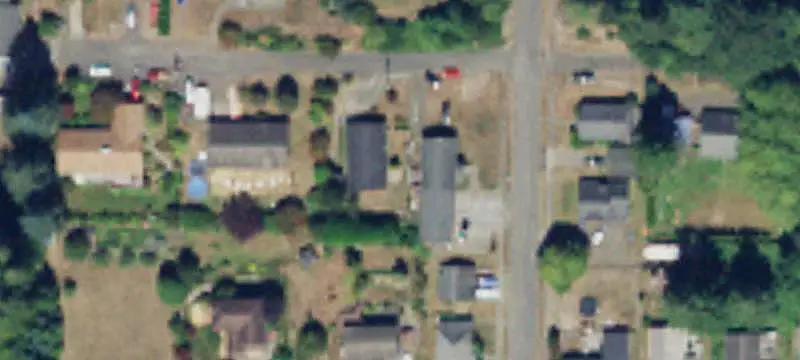 Duplex With Three-Car Garage