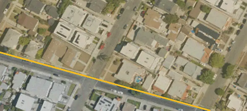 Triplex with Four Garages
