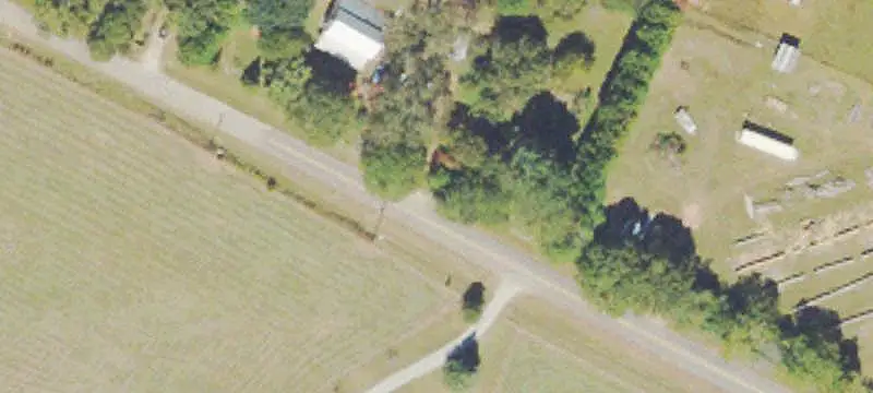 Corner Commercial Land with Log Cabin