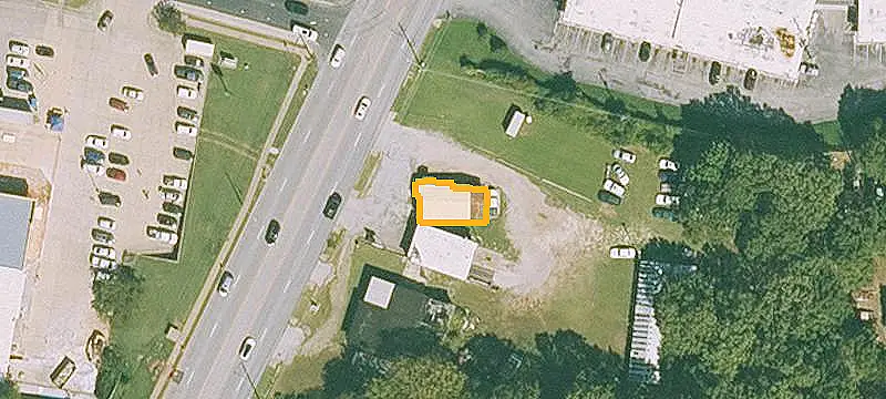 Commercial Land with Existing Buildings