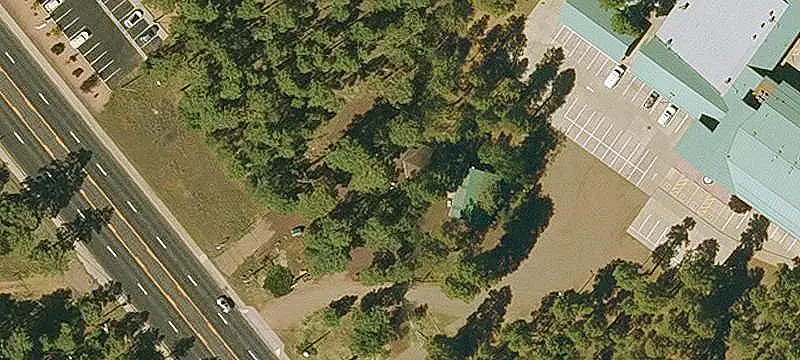 Storefront Property With Log Cabin