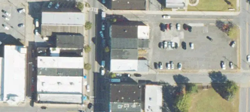 Brick Storefront with Parking Lot