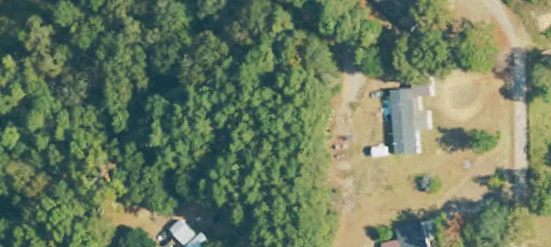 Fenced Pastureland With Barn