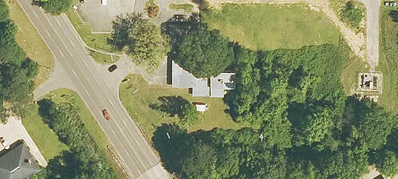 Storefront Building with Plank Road Visibility