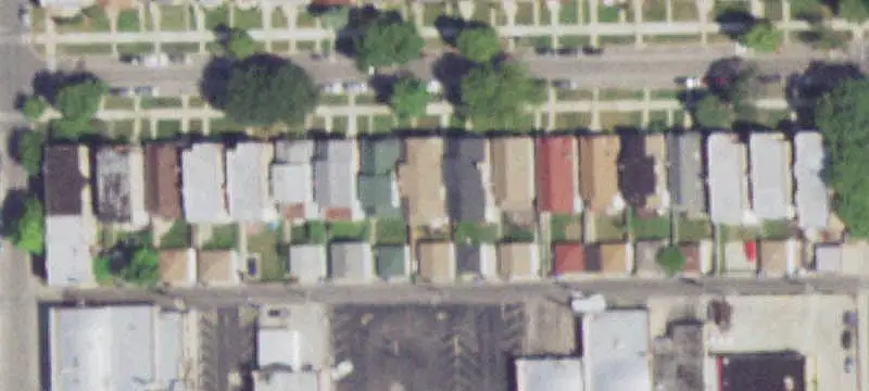 Triplex Brick Building with Garage