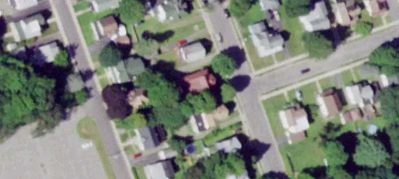 Adjacent Apartment Buildings with Updated Roofing