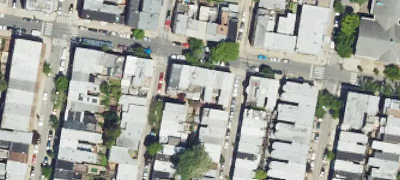 Updated Triplex with Private Backyard