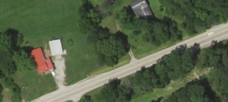 Acreage Duplex with Outbuildings