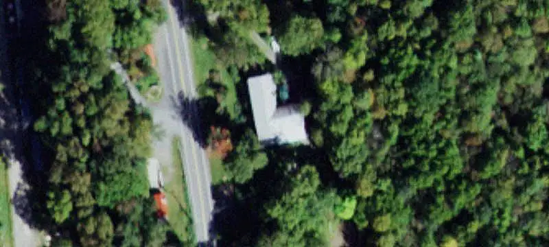 Riverfront Land with Two Buildings