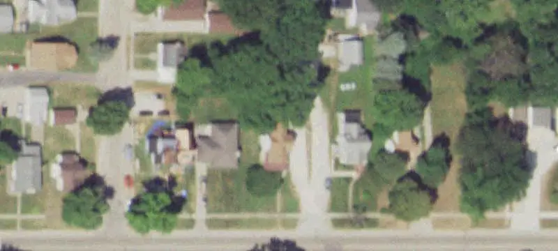 Duplex with Detached Three-Car Garage