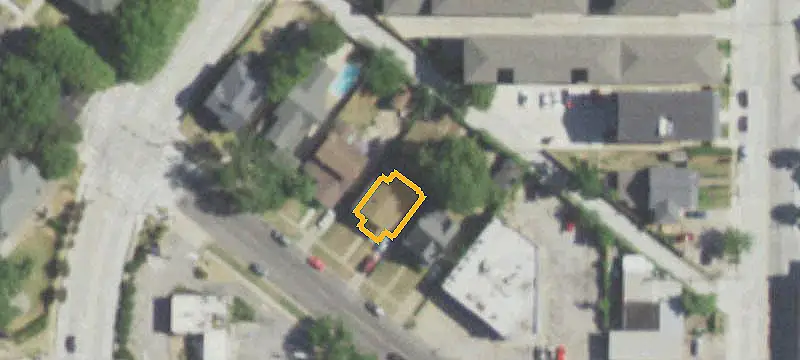 Two-Story Duplex Requiring Rehabilitation