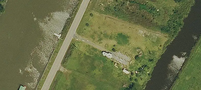 Waterfront Land with Metal Building