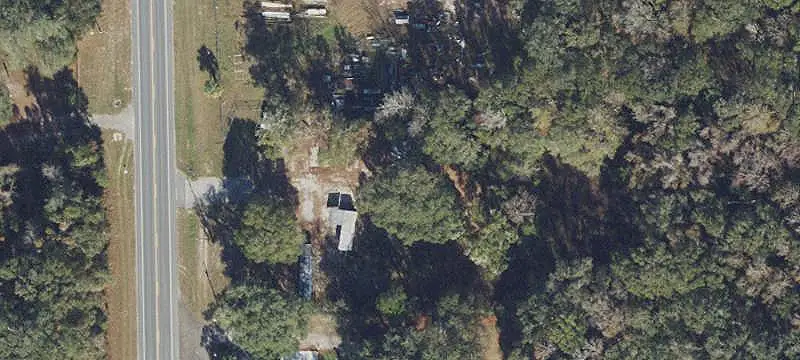Fenced Commercial Land With Improvements