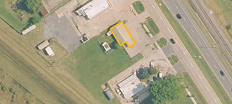 Fenced Gravel Commercial Land