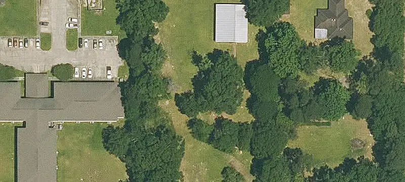 Commercial Land with Industrial Improvements
