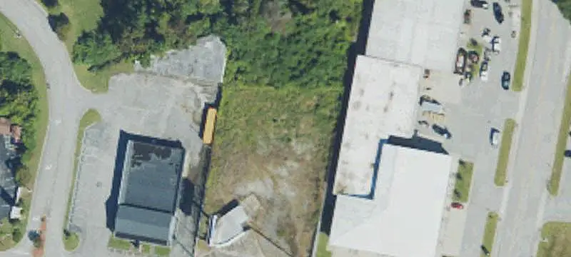 Fenced Industrial Land with Building