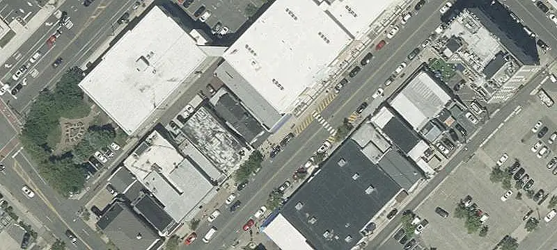 Mixed-Use Storefront with Two Apartments
