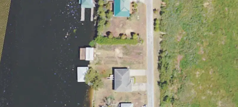 Waterfront Land With Boathouse