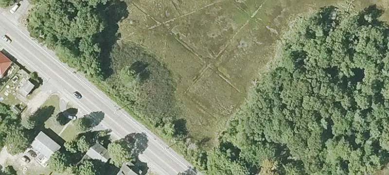 Fenced Commercial Land With Sheds
