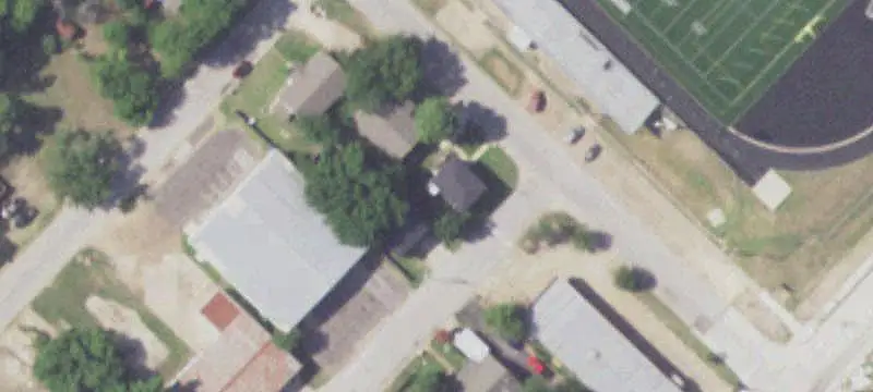 Tenant-Occupied Triplex with Garage Apartment