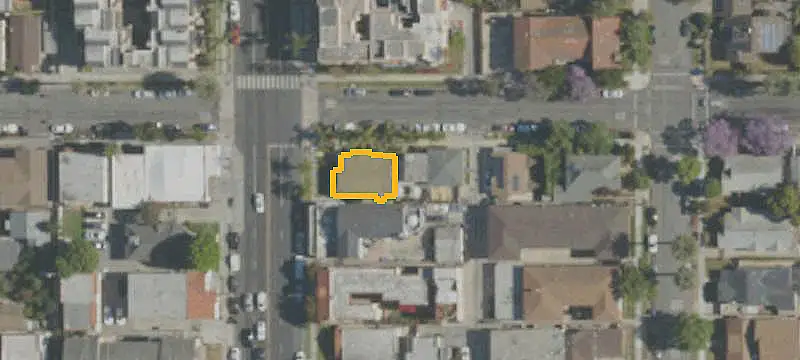 Corner-Lot Duplex with Courtyard