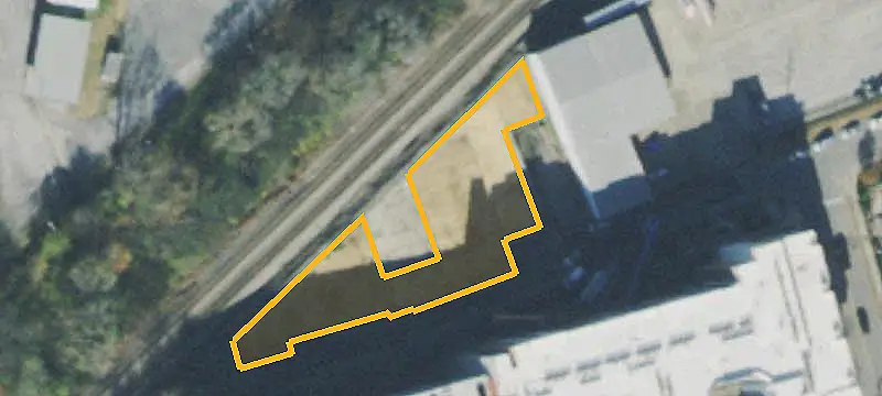 Fenced Paved Commercial Land
