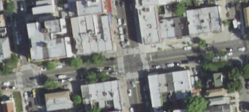 Occupied Mixed-Use Corner Building