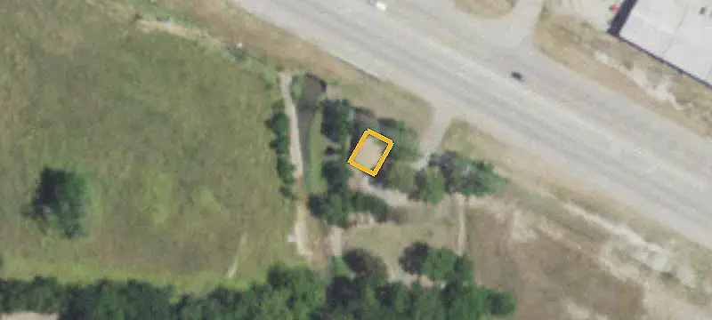 Highway Commercial Land with Existing Structure