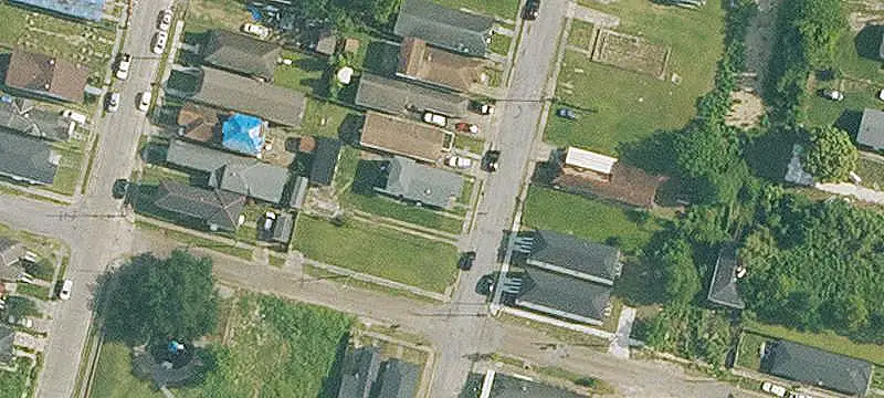 Occupied Triplex with Parking Lot