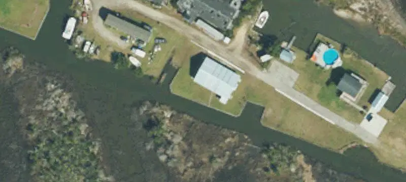 Waterfront Land with Block Building