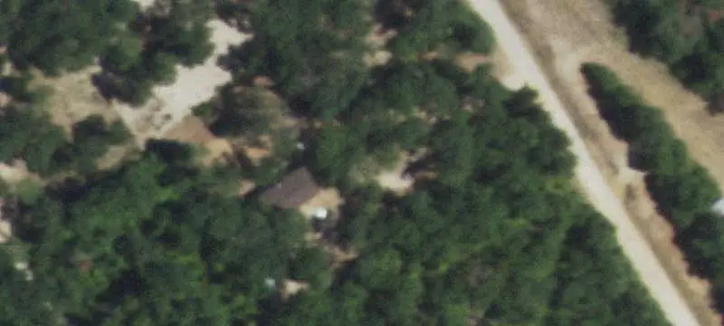 Wooded Farm with Hilltop Home