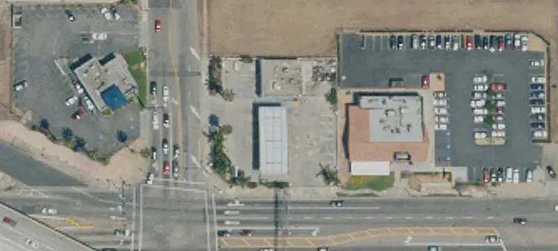 Corner Auto Shop with Drive-Through Bays
