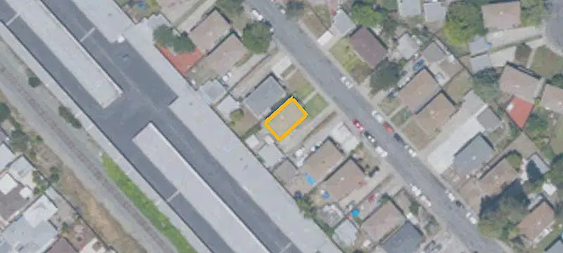 Duplex With Detached Two-Car Garage