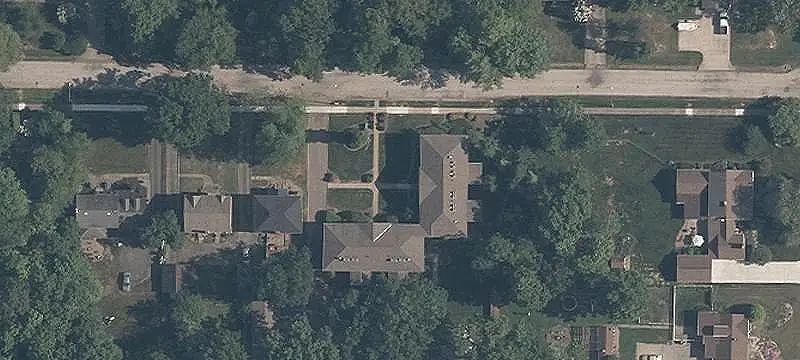 Brick Apartment Building with Sunrooms