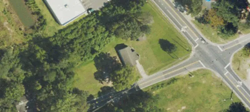 Level Commercial Land with Existing Home