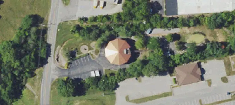 Decagonal Glass-and-Stone Mixed-Use Property