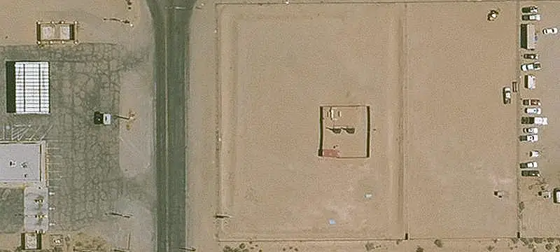 Fenced Commercial Corner Land