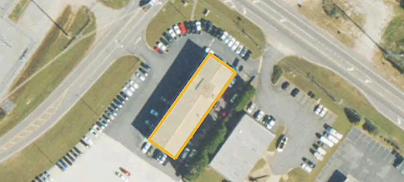 Automotive Shop with Rooftop Helipad