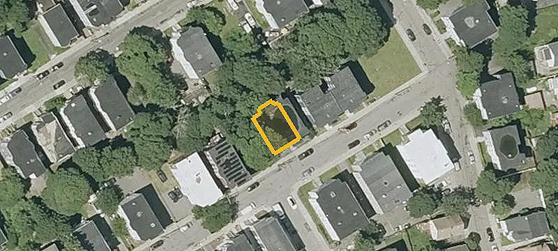 Updated Triplex with Additional Lot