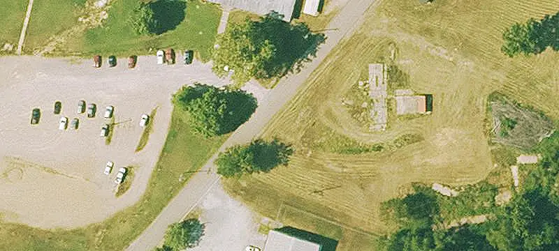 School Building with Fenced Playground