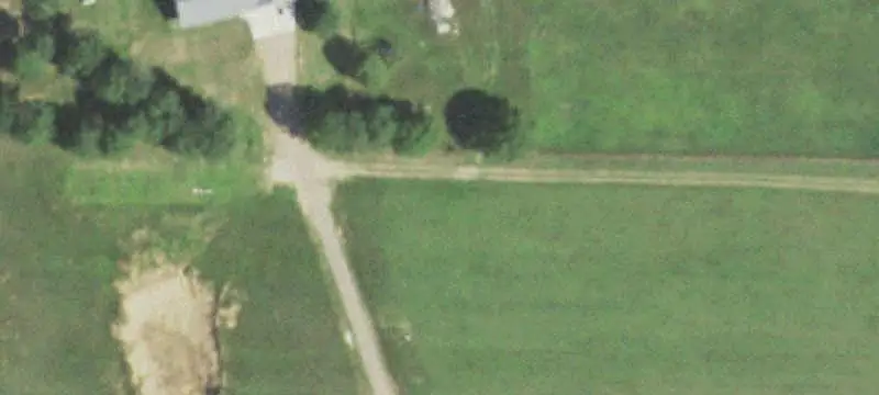 Wooded Land with Open Field