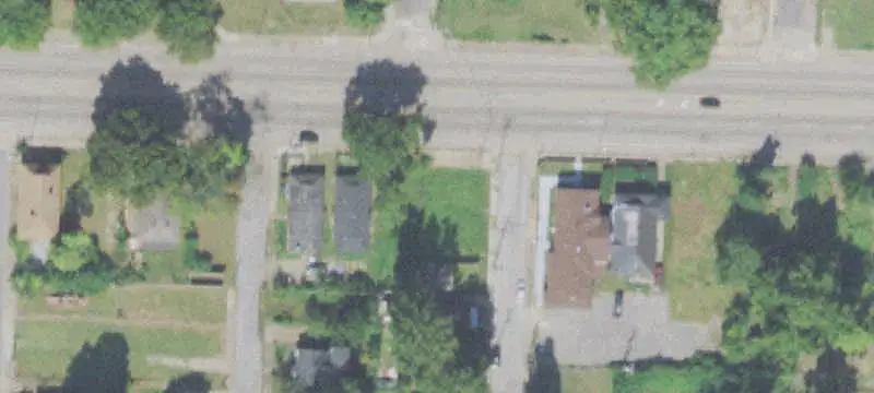 Corner Commercial Land with Brick Building