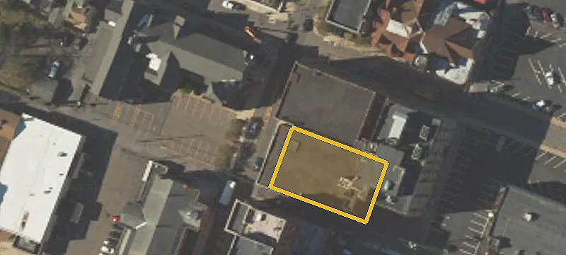 Commercial Land with Existing Buildings