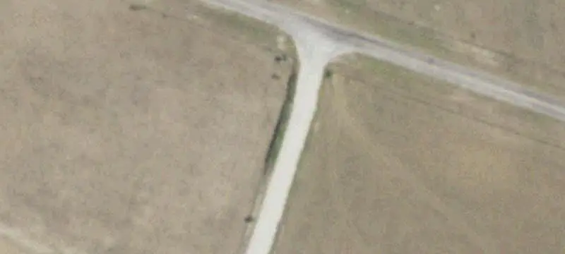 Contiguous Farmland with Greenhouses