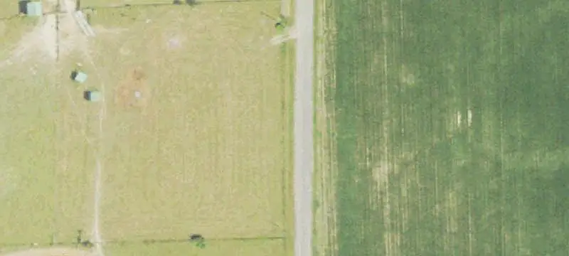 Fenced Cattle Farm With Barn