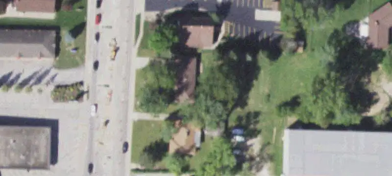 Commercial Land with Brick Ranch