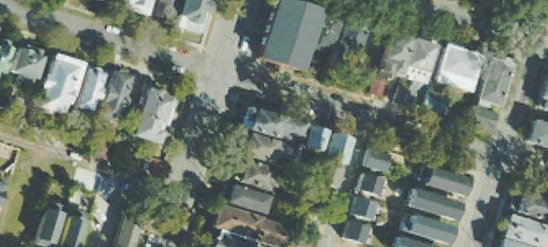 Corner-Lot Triplex with Courtyard
